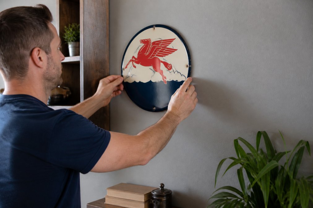 How to Hang Metal Signs Without Damaging Walls