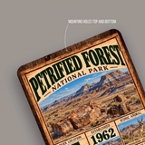 Close-up of rounded corners and predrilled mounting holes on the Petrified Forest aluminum sign